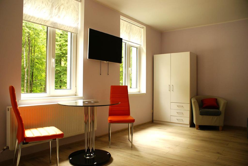 Ecolive Aparthotel Рига Стая снимка
